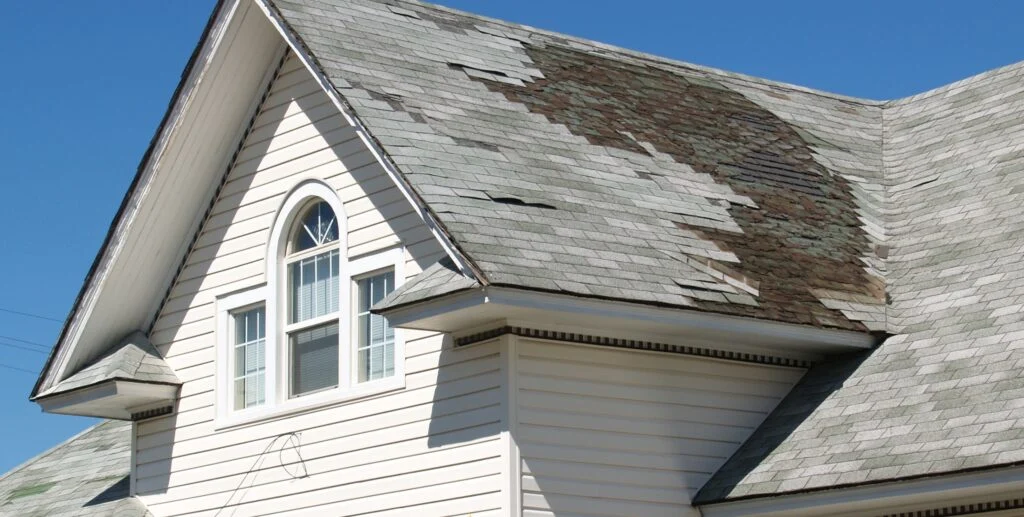 New Law Carries Implications For Roofing and Insurance—Here’s What Investors Need to Know damaged roof