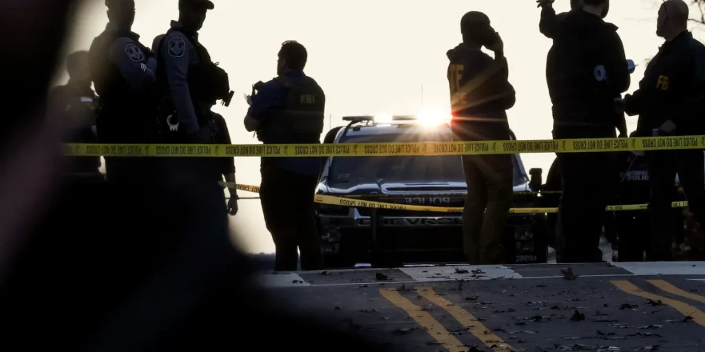 Trump orders new immigration curbs as FBI probes guard shooting