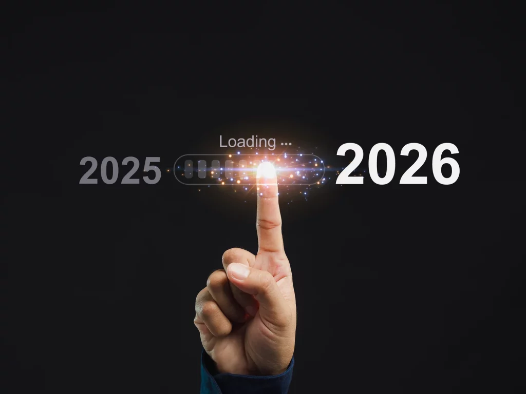 Hand pointing at progress bar loading 2026. Concept of future and technology.