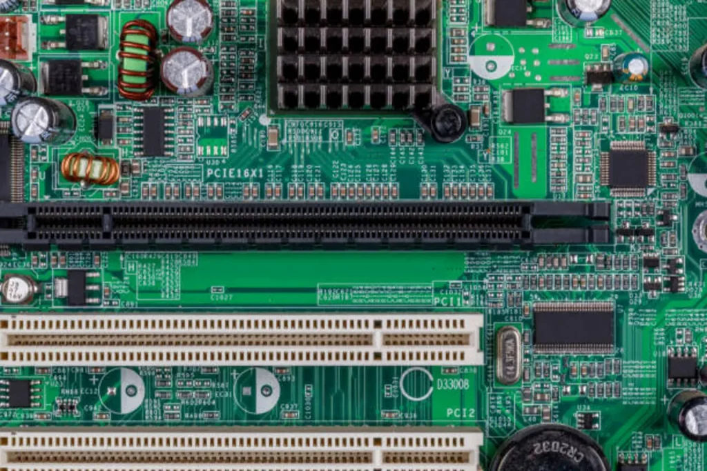 TTM Technologies Rides Both Defense Supercycle And Datacenter Gold Rush (NASDAQ:TTMI) Section of a computer circuit board photographed close up, United Kingdom