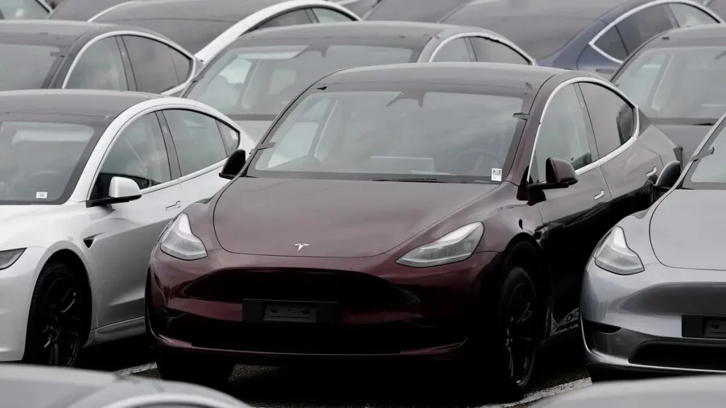 Tesla loses title as world's biggest electric vehicle maker as sales fall for second year in row