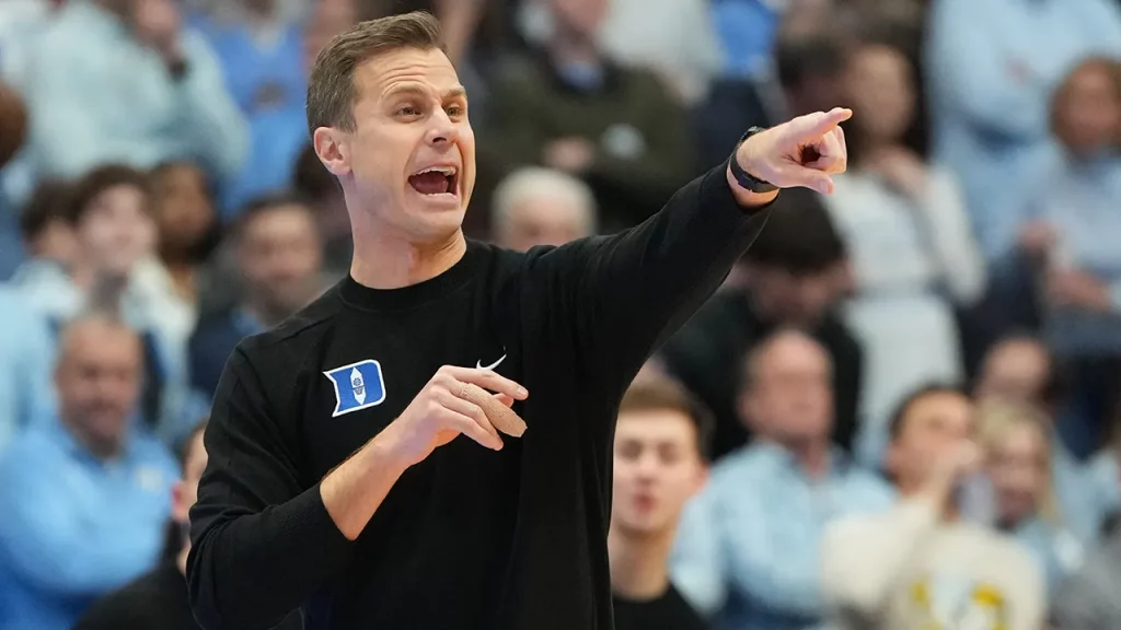 Duke staffers 'punched in the face' during UNC court-storming, coach says